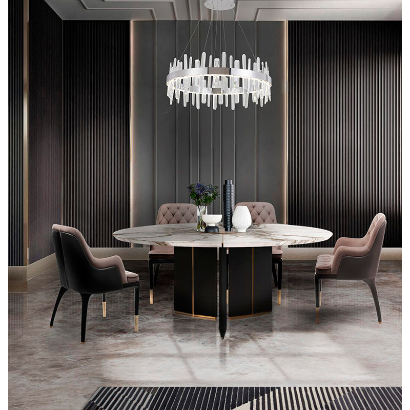 32-inch Chrome Ring Cut crystal chandelier suspended over a modern round marble dining table in a luxury interior.
