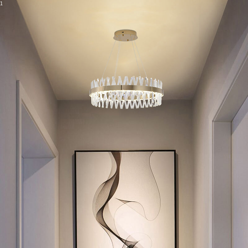 26-inch golden crystal chandelier used as a statement entryway light, showing the soft glow on a hallway ceiling.