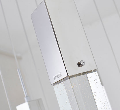 Close-up of the chrome mounting hardware and the top of the crystal cylinders, showing the high-quality reflective finish.