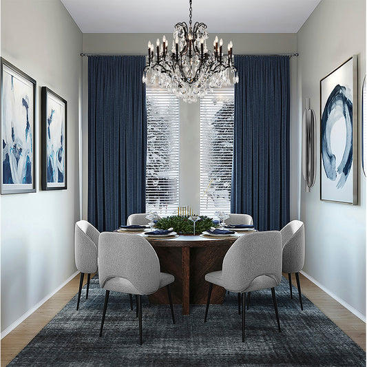 31-inch 2-tier sandy black crystal chandelier suspended in a contemporary dining room with blue curtains and grey chairs.
