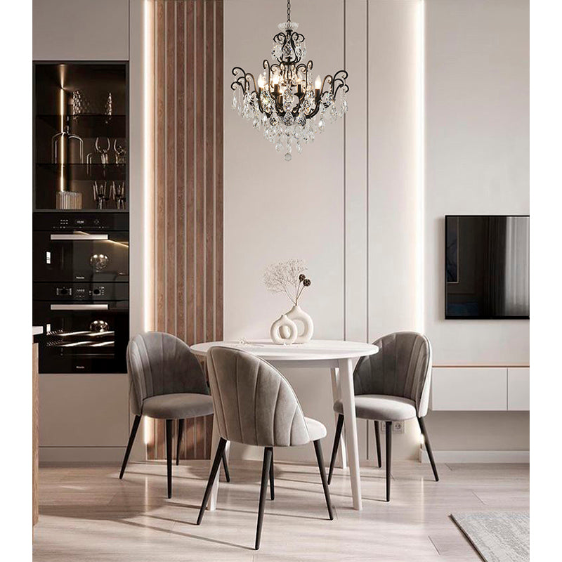 27-inch matte black 2-tier crystal chandelier in a modern minimalist dining room with grey upholstered chairs.