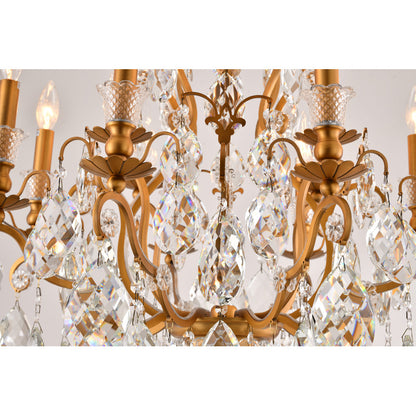 Detail of the lower brass tier featuring decorative rosettes and hanging crystal pendeloques.