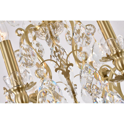 Macro shot of the brass candle sleeves and bobeches accented with sparkling crystal pendants.