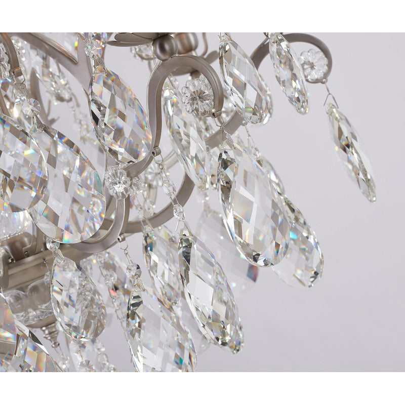 Close-up of the bottom tier's central pewter ring and cascading faceted crystal prisms.