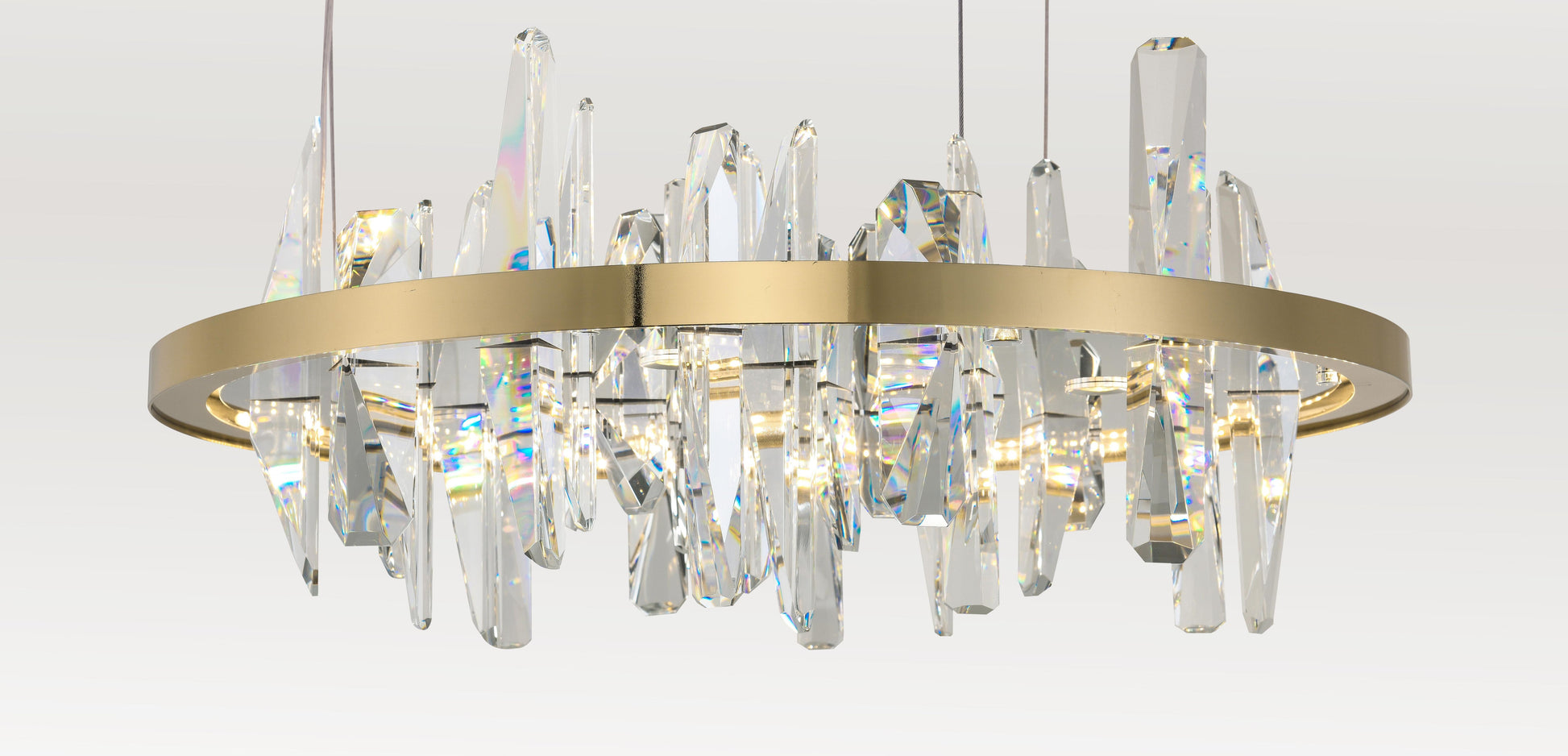 Golden Ring 23-inch round cut crystal chandelier for dining rooms, shown lit.